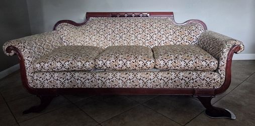 Vintage Ornate Wood Frame Sofa with Patterned Upholstery