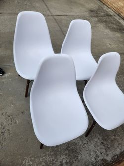 Brand new set of 4 white dining chairs