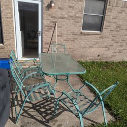 Backyard Glass Table And Chairs