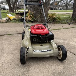 Harmony 215  Honda SX de transmicion