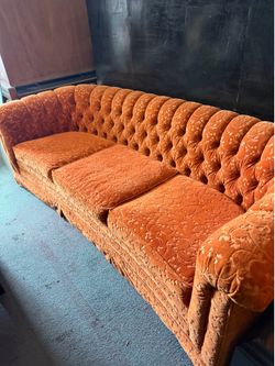 Vintage 1970s Hollywood regency burnt orange velvet tufted sofa + chair
