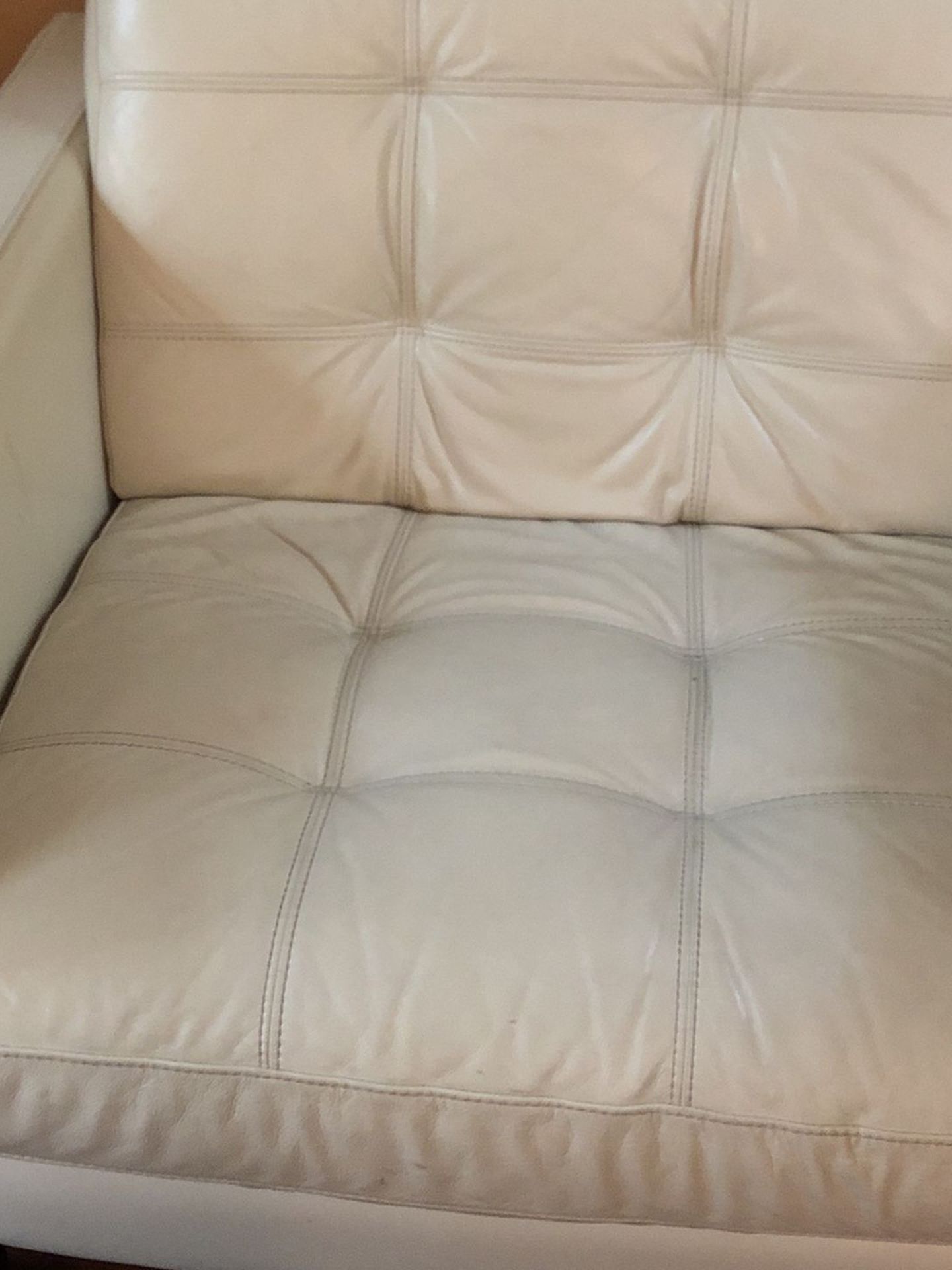 2 Tan/beige Leather Chairs
