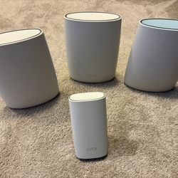 NETGEAR Orbi Router Whole Home Mesh WiFi System with 3 Satellite Extenders for homes up to 6,000sqft 
