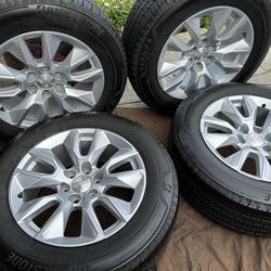 20” Chevy Wheels with BRIDGESTONE TIRES LIKE NEW LOOK AT ALL PICTURES BEFORE CONTACTING ME