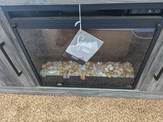 Ashley  tv stand fire place