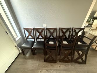 8 wood strong chairs $450 obo