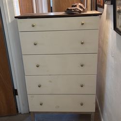 Dresser w/5  working drawers that have metal slides that all work .