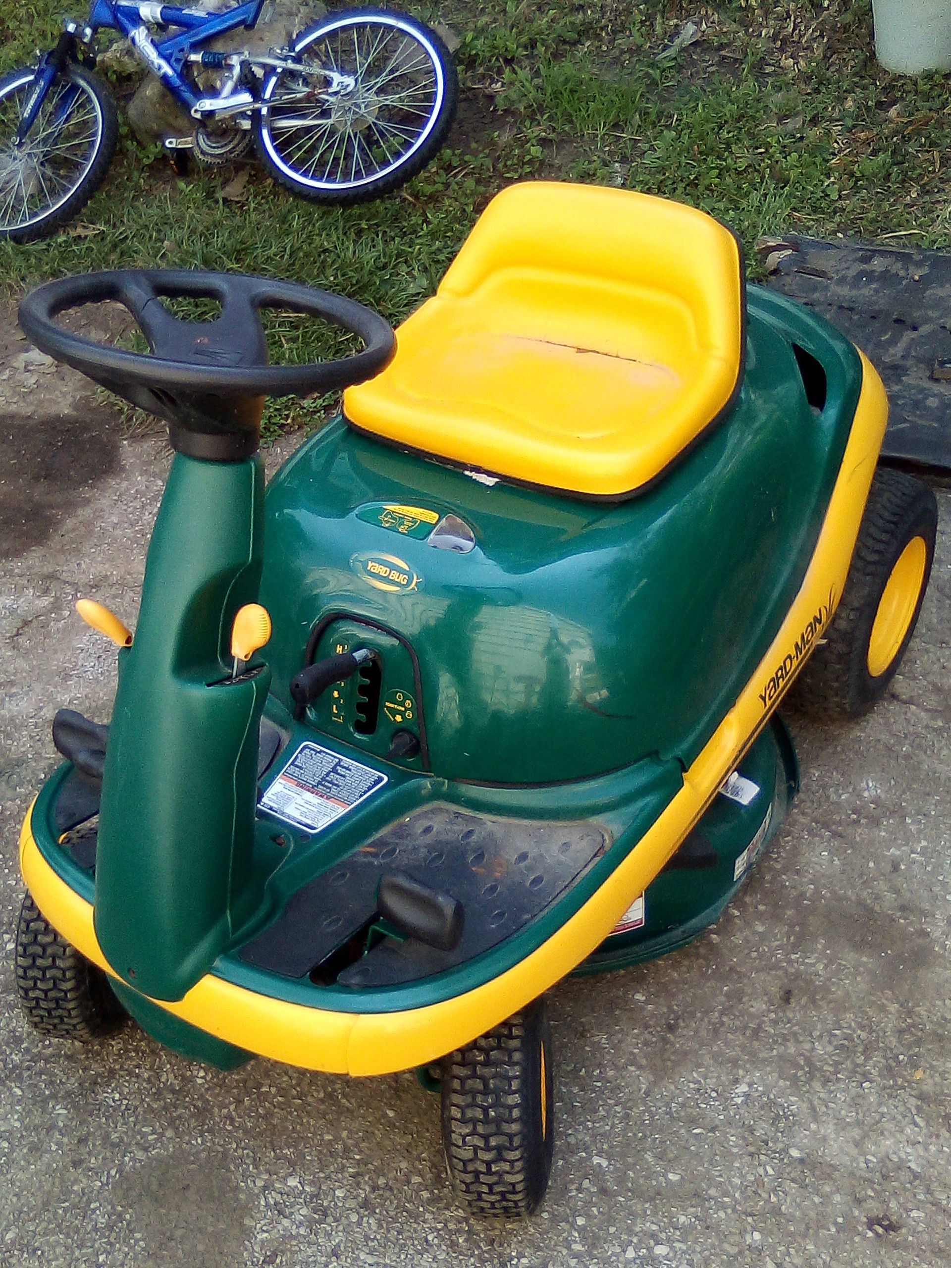 Lil Green ridng Bug mower.MTD