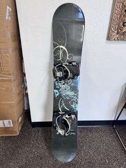 147cm snowboard and binding.