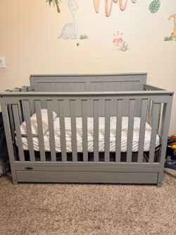 Grey Graco Crib