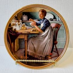 Norman Rockwell:  "Working In The Kitchen"