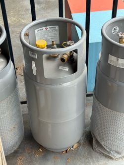 Three 33.5 pound aluminum propane tanks