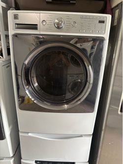 Kenmore Elite  Steam  Gas dryer Excellent working condition  Heavy duty  W27 D30 H53 including pedestal  7.3 cu ft 3 months warranty parts and labor o