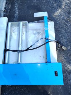 Two shrink wrapper machines 24 inch plus shrinkwrap collection