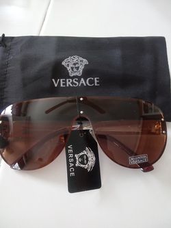 Versace Sunglasses....Brown.. Gold Rims