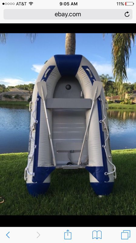 Inflatable boat with aluminum floors 9 1/2 foot last one available
