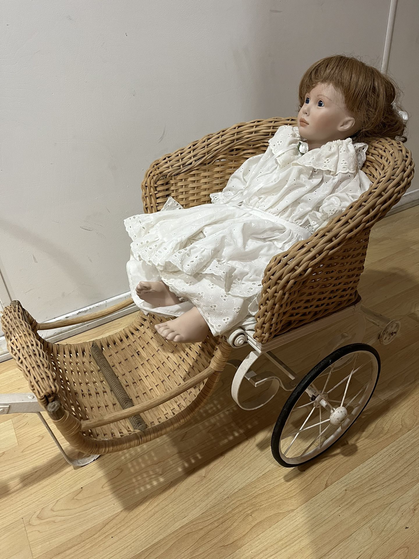 Wicker Porcelain Baby Doll In White Wicker And Metal 