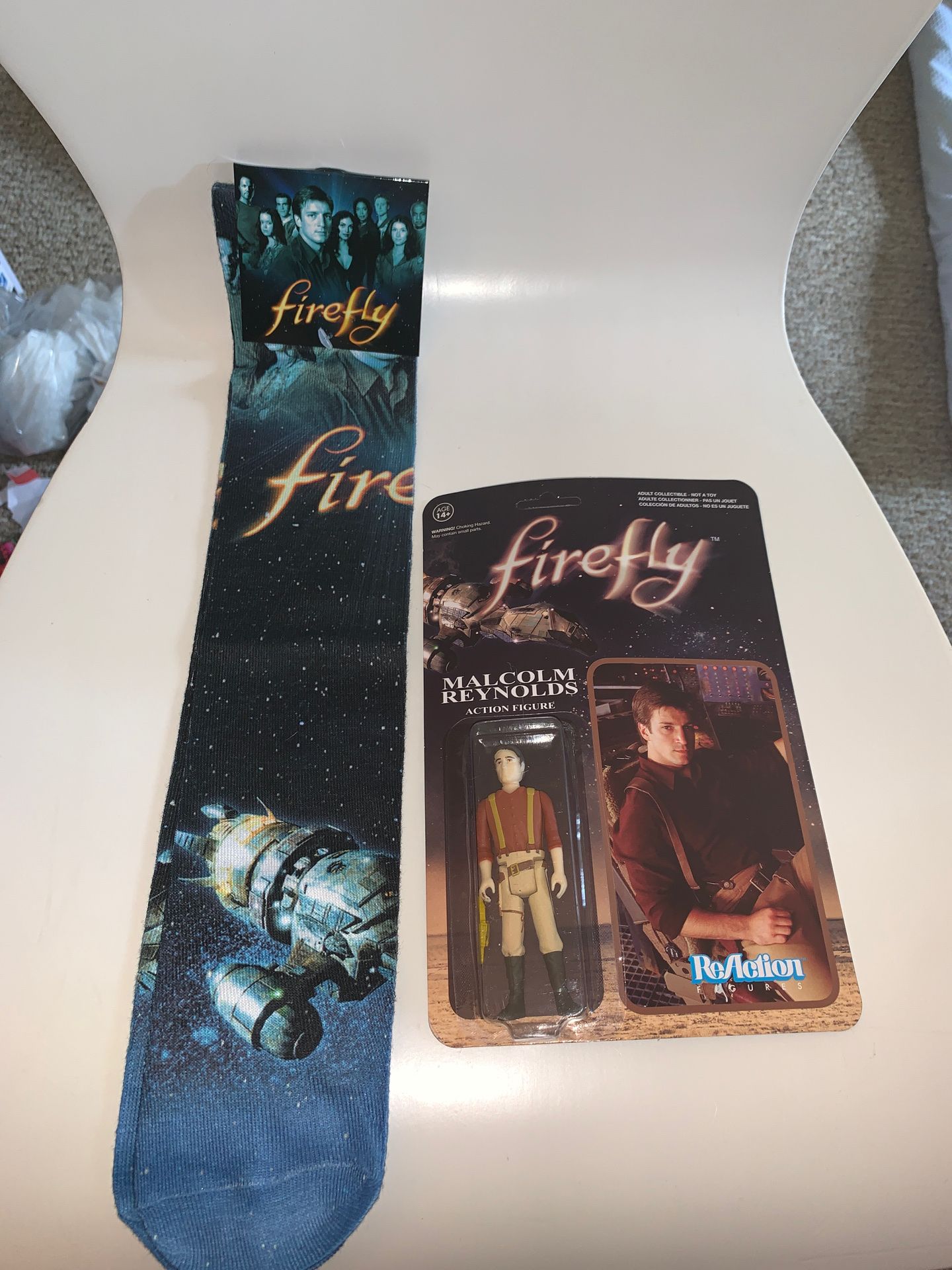 Firefly socks and collectible action figure Malcolm Reynolds