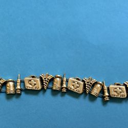 Nurse Cookie Lee gold tone bracelet