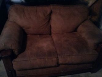Small two sitter couch still good condition