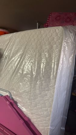 new  twin mattress  I have two new twin each for $100