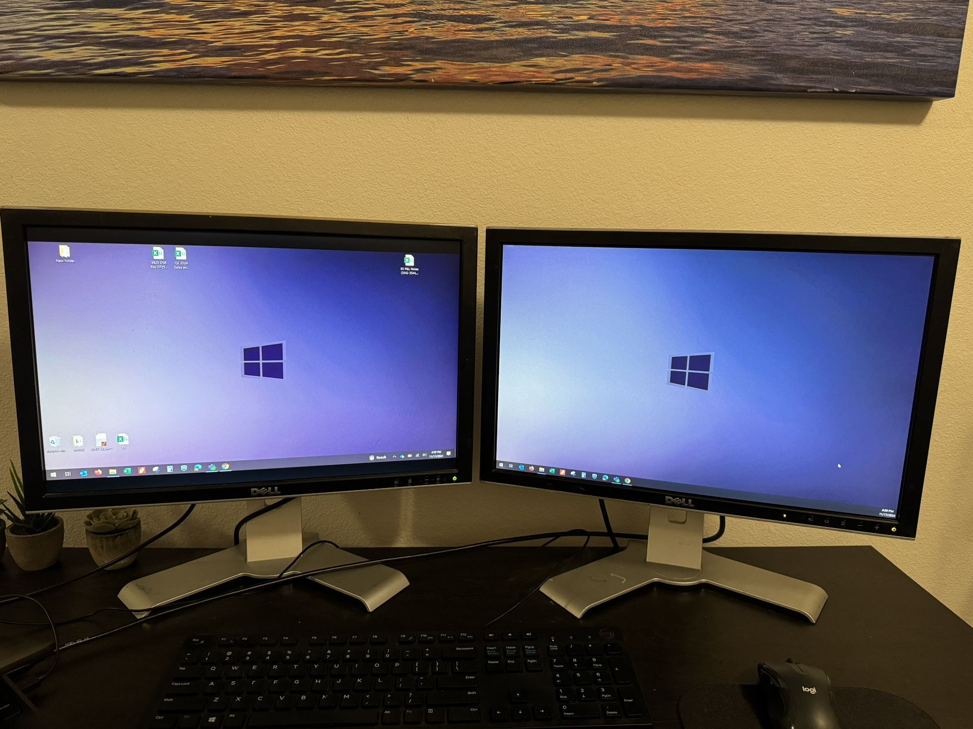 Two Dual 21” Dell Monitors (Black with silver Adjustable Height Stands)