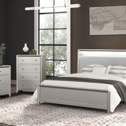 The Bryne bedroom set, with its sleek champagne finish, features a bookcase headboard with LED lighting and USB chargers, perfectly paired with matchi