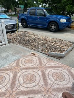 Clean river stones—come and pick them up. They are very nice; I changed the look of my yard.