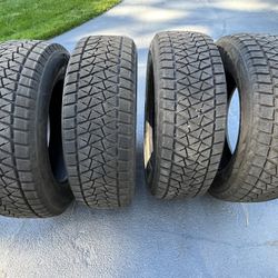 4 Nearly New Blizzak 235/6518 Snow Tires