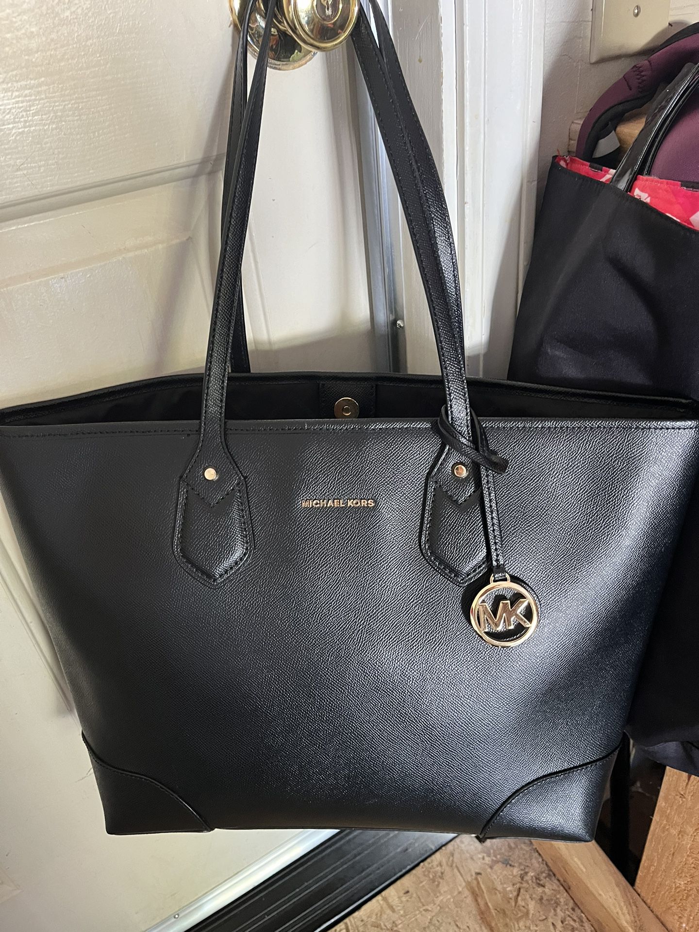 Michael Kors Purse Condition Like New it’s hundred percent leather