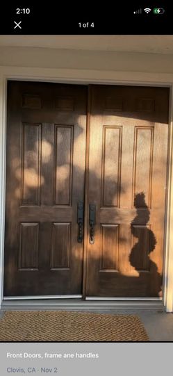 Front double door solid- with frame / keys - 95 each long / 36 inches each door .  Brown color is exterior and white is interior of the same double do