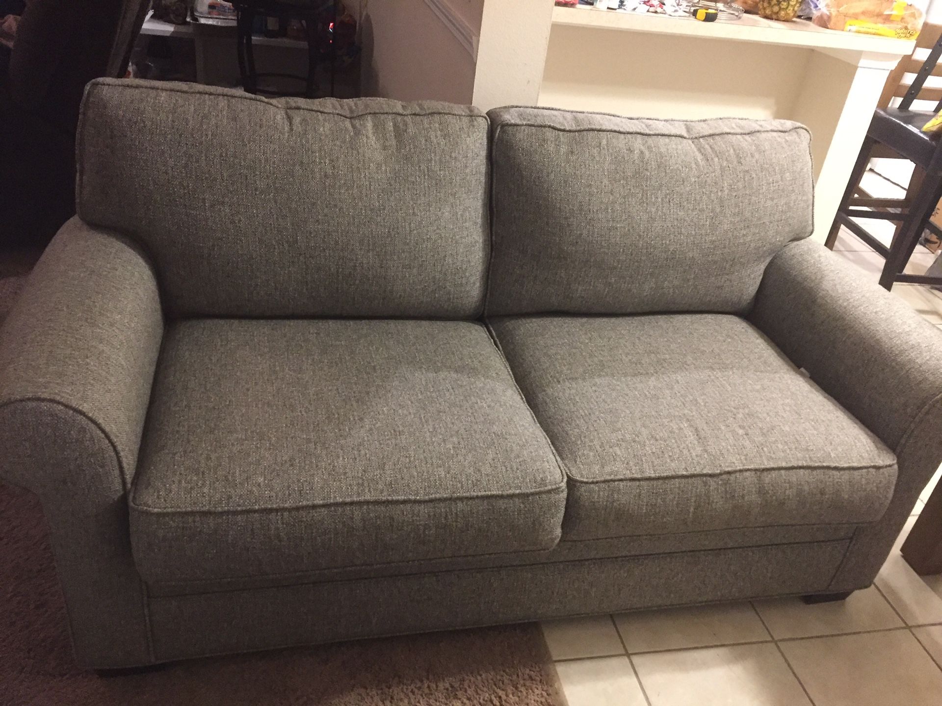 Beautiful Ashley’s sofa/love seat in perfect condition, like new. Gray color.