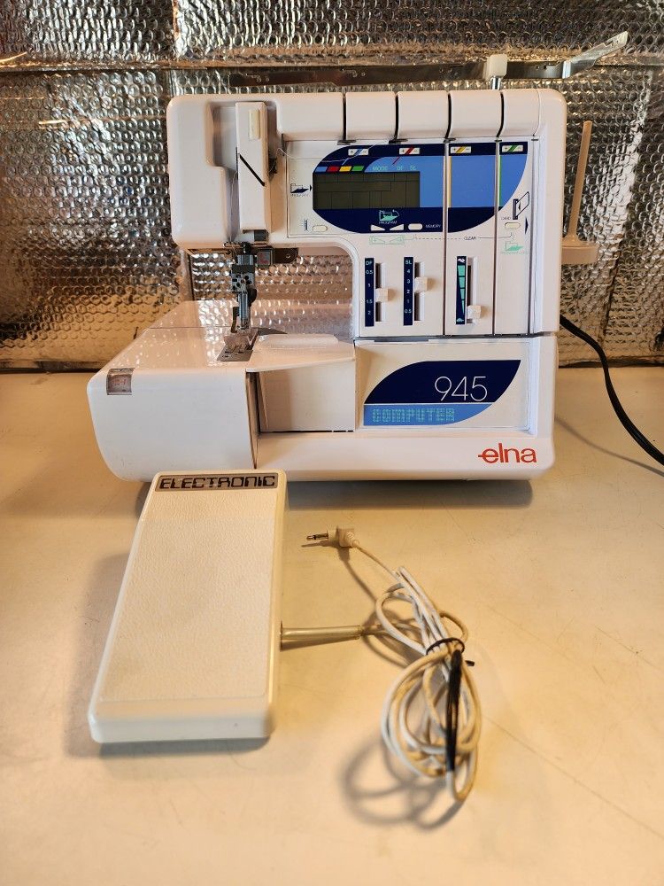 Elna 945 COMPUTER SERGER. WITH FOOT PEDAL WORKING $250.00 OBO SERIOUS BUYERS ONLY