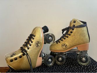 Never worn roller skates Glittery Gold Roller Skates new in box! Size 6