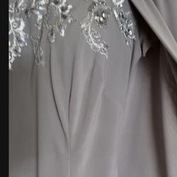 It’s A Beautiful Long Evening Dress in Size 6 The Color Is Light Gray Made By JANIQUE USED One Time Only 