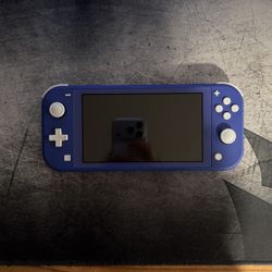 Nintendo Switch Lite (purple) (comes with game, case, and charger)