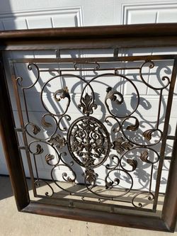 Wrought iron wall frame