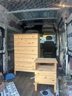 Preston’s wood dresser with a mini drawer