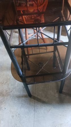 Two end tables iron base glass top
