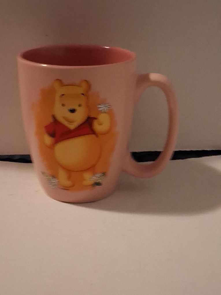 Nice Disney Store Winnie the Pooh Holding A Flower Mug 