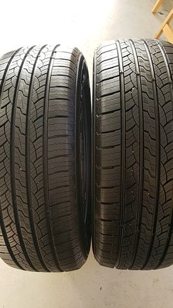 Voyager in good condition 2 tires 245 60 18 100% tread