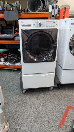 220/240 Electric Front Load Dryer Kenmore . With storage pedestal. . See description below