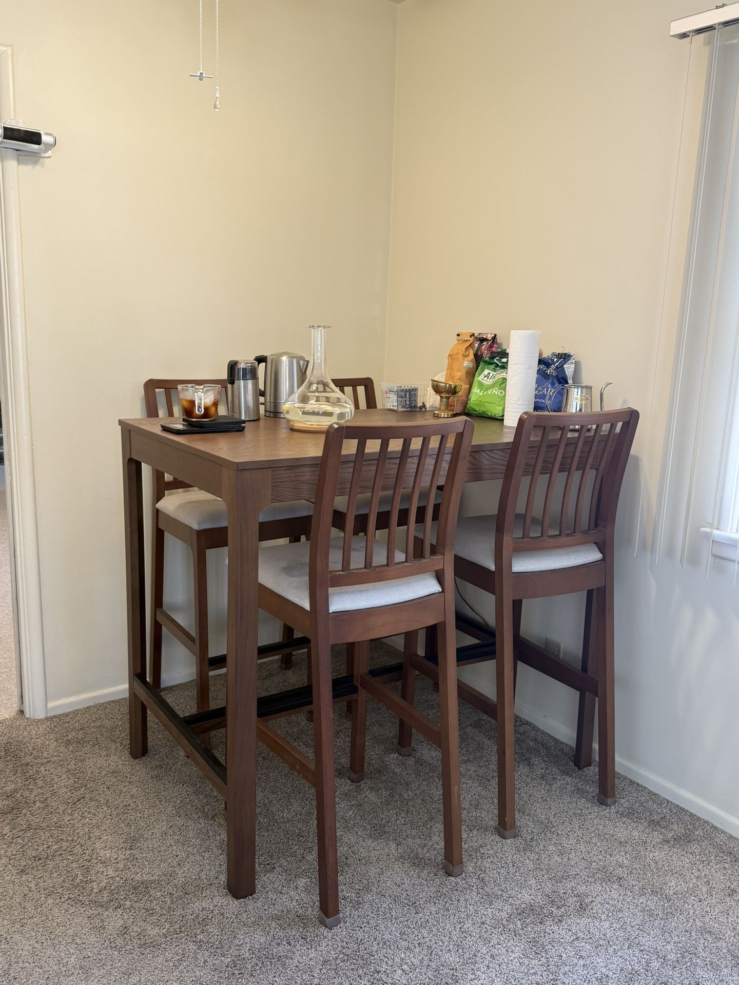 Dining table and bar stools