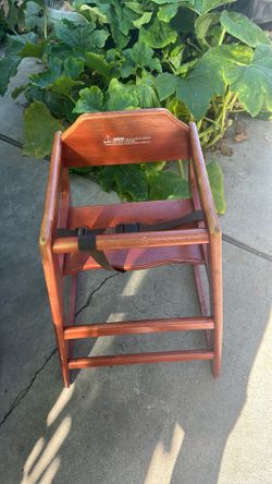 Kids wooden highchair.