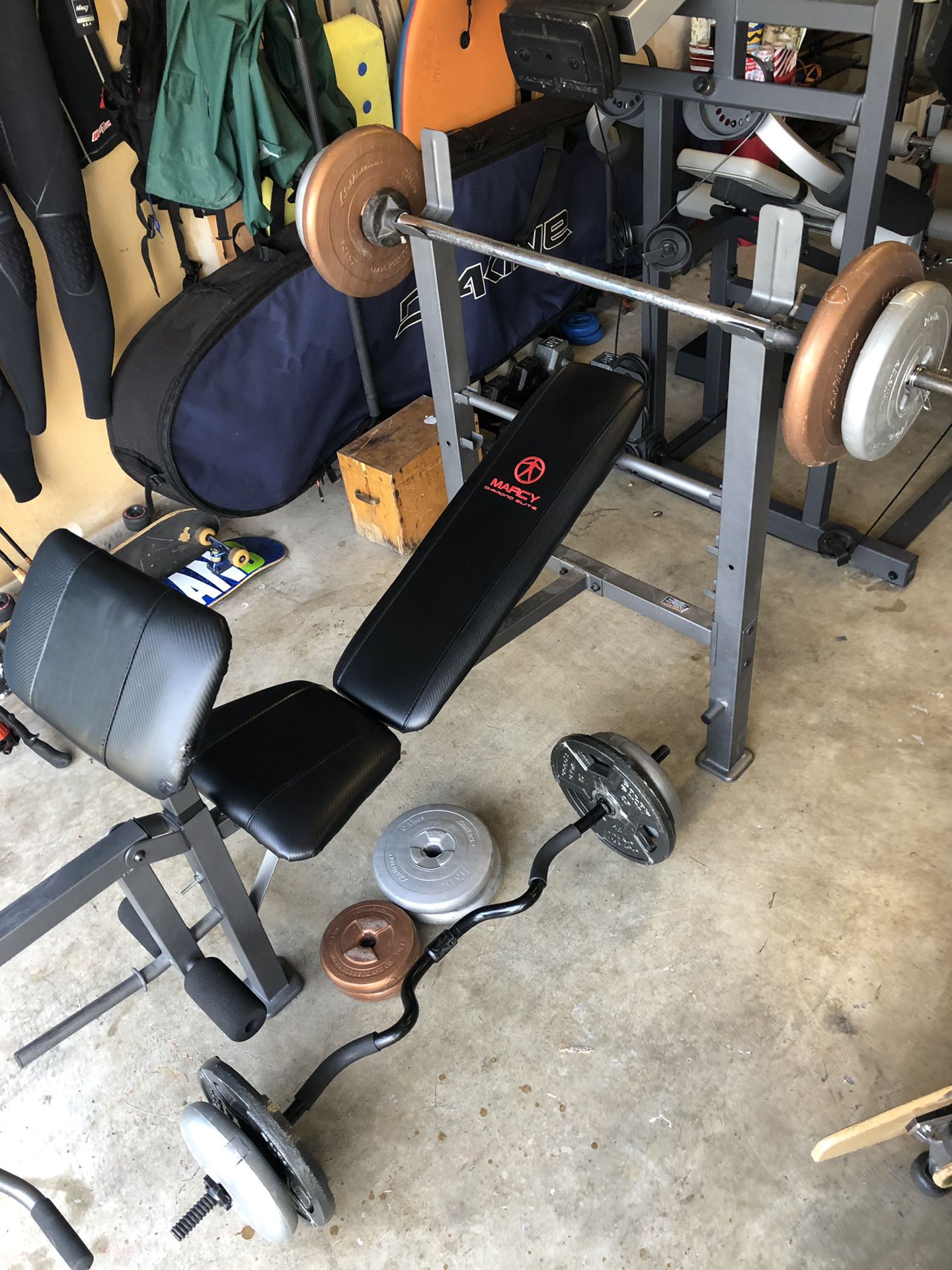 Weight bench w/ weights & curl bar