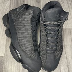 Black Cat Jordan 13s