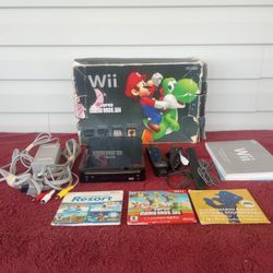 Wii Black Console with New Super Mario Brothers Wii and Music CD