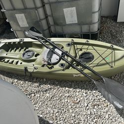 Two kayaks with paddles