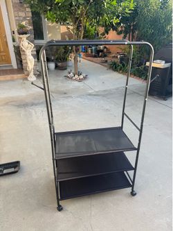 Clothes rolling rack