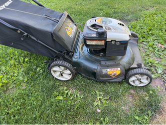 Yard Man Push Mower 190cc w/21” Cut And Bag. Runs And Cuts Good